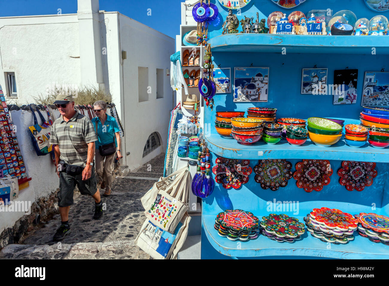 Souvenirs shop with traditional greek products Oia Santorini street Greek Islands Greece streets Stock Photo