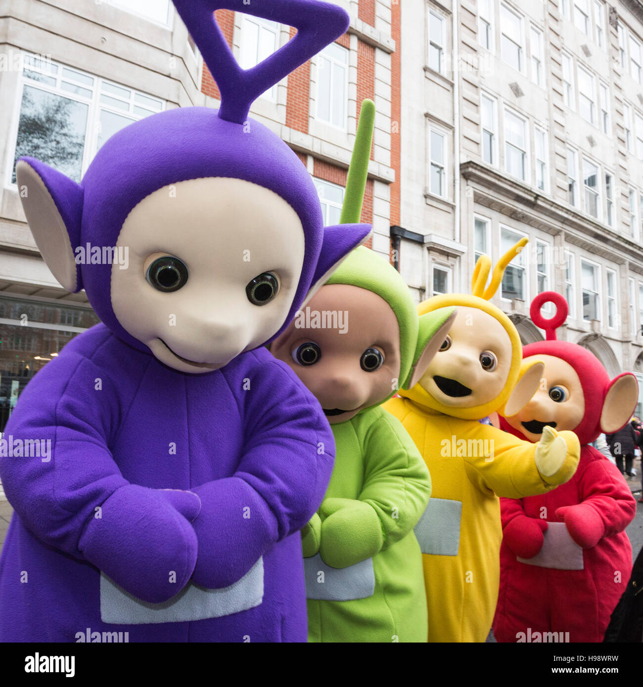 London, UK. 20 November 2016. Teletubbies on their way to the parade. The 2016 Hamleys Christmas Toy Parade takes place along Regent Street, which went traffic-free for the day. The parade organised by the world-famous toy store Hamleys featured over many of the nation's favourite children's characters along with entertainers, a marching band and giant balloons. The parade is modelled on Macy's annual Thanksgiving Parade in New York. Credit:  Bettina Strenske/Alamy Live News Stock Photo