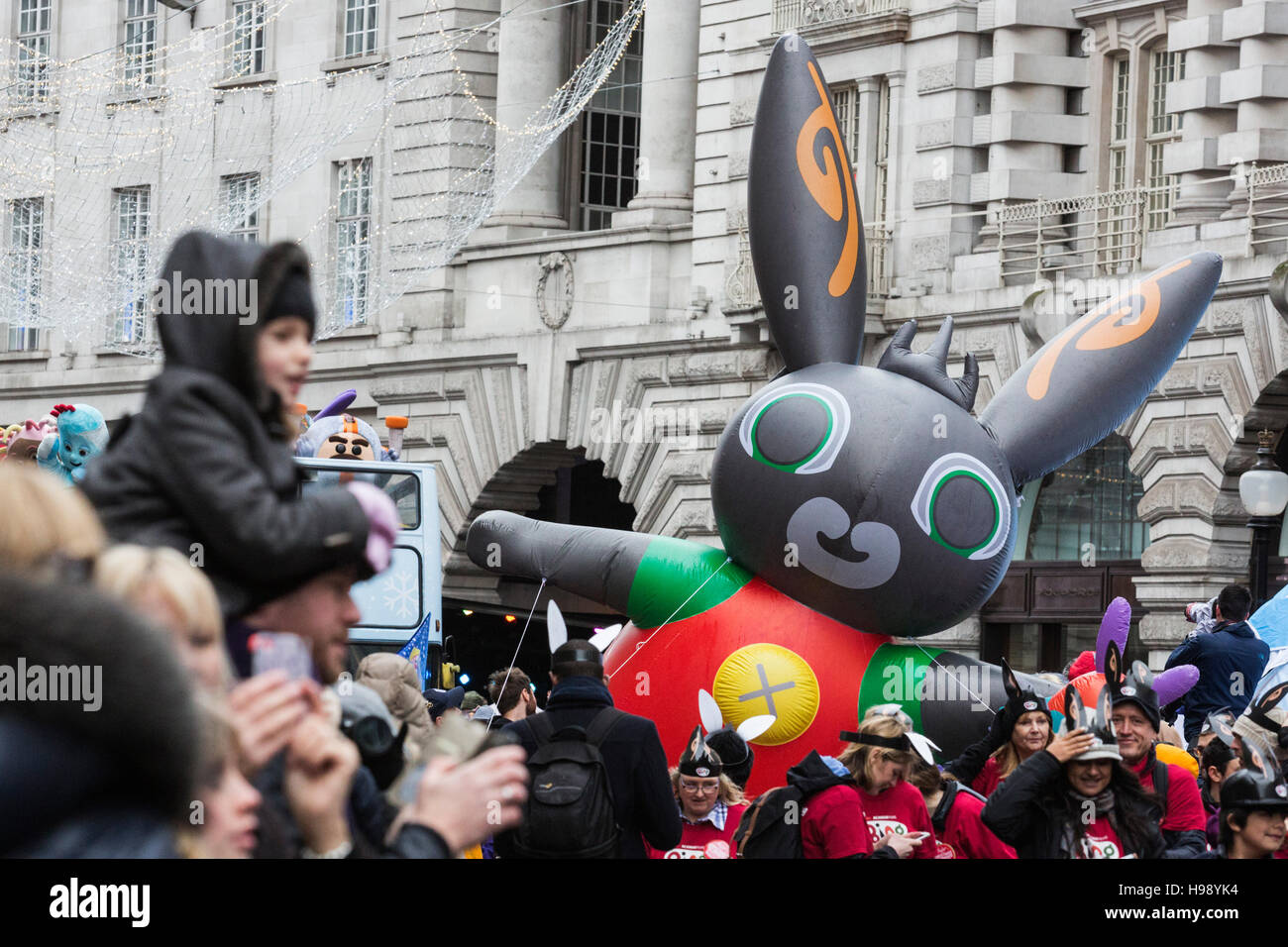 London, UK. 20 November 2016. Giant inflatable Bing with his Hoppity Voosh  toy. The 2016 Hamleys Christmas Toy Parade takes place along Regent Street,  which went traffic-free for the day. The parade