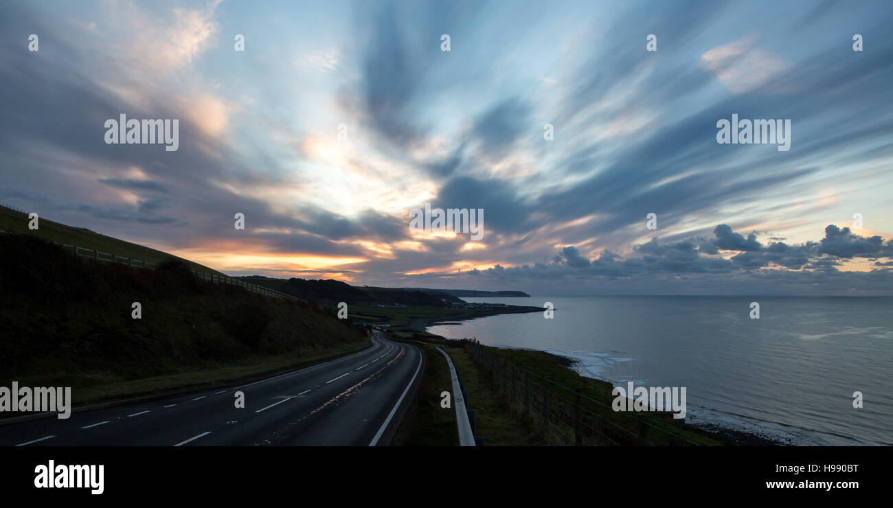 Dark Sunset And Clouds As Seen From The A487 Coastal Road Overlooking Dark Sunset And Clouds As Seen From The A487 Coastal Road Overlooking