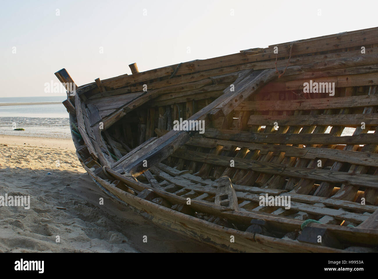 Dhow on the beach, out of service Stock Photo