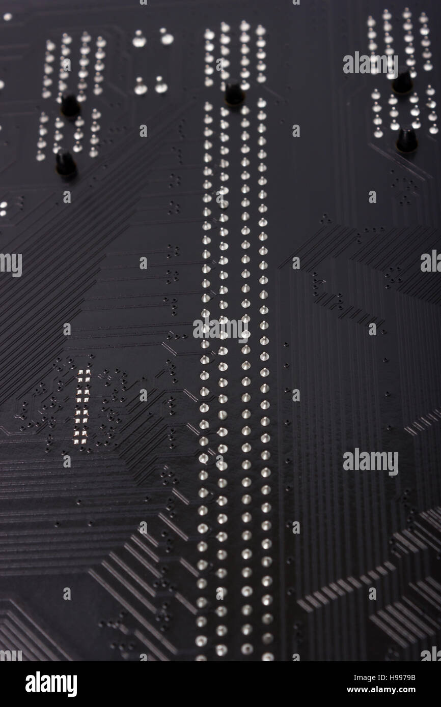 Close up shot of the backside computer mainboard Stock Photo