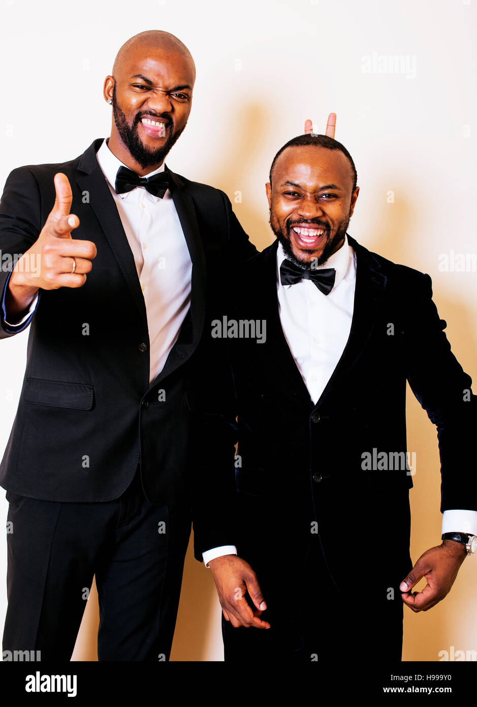 two afro-american businessmen in black suits emotional posing, g Stock ...