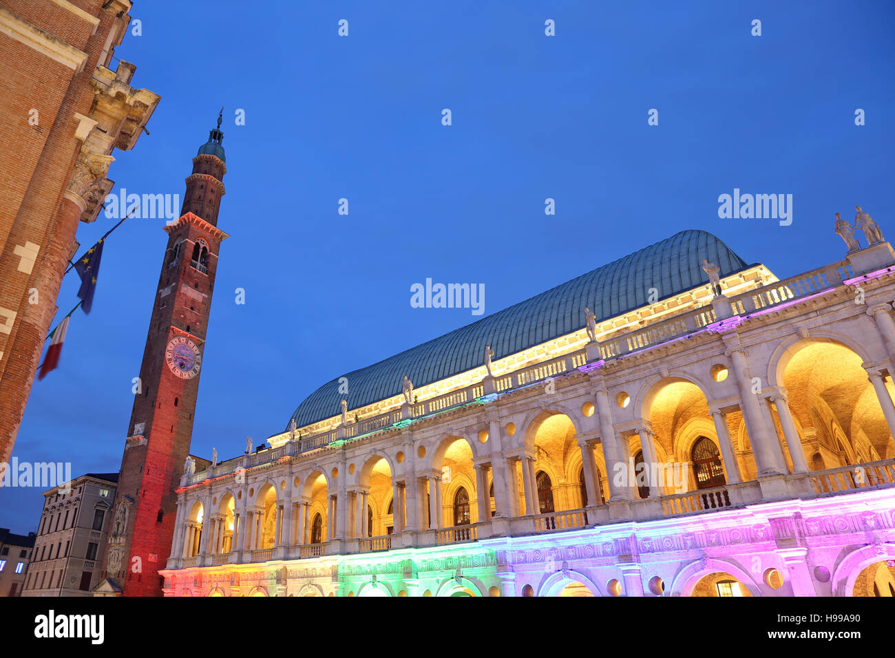 Historic monument called Basilica Palladiana with multi colored lights