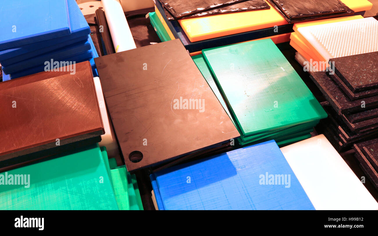 stall with many industrial plastic cutting boards for sale to the highest bidder Stock Photo