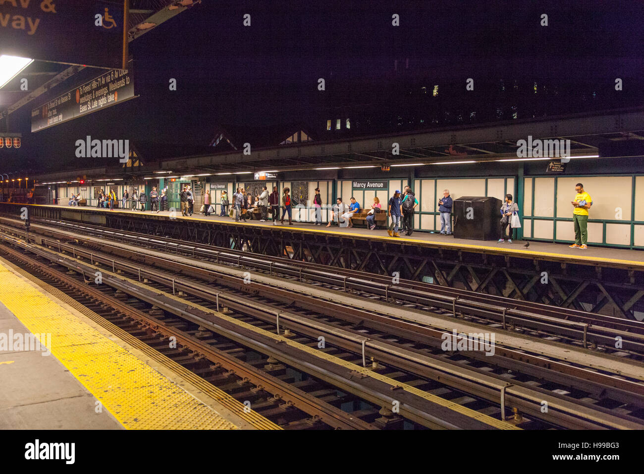 Marcy avenue elevated subway station at night hires stock photography