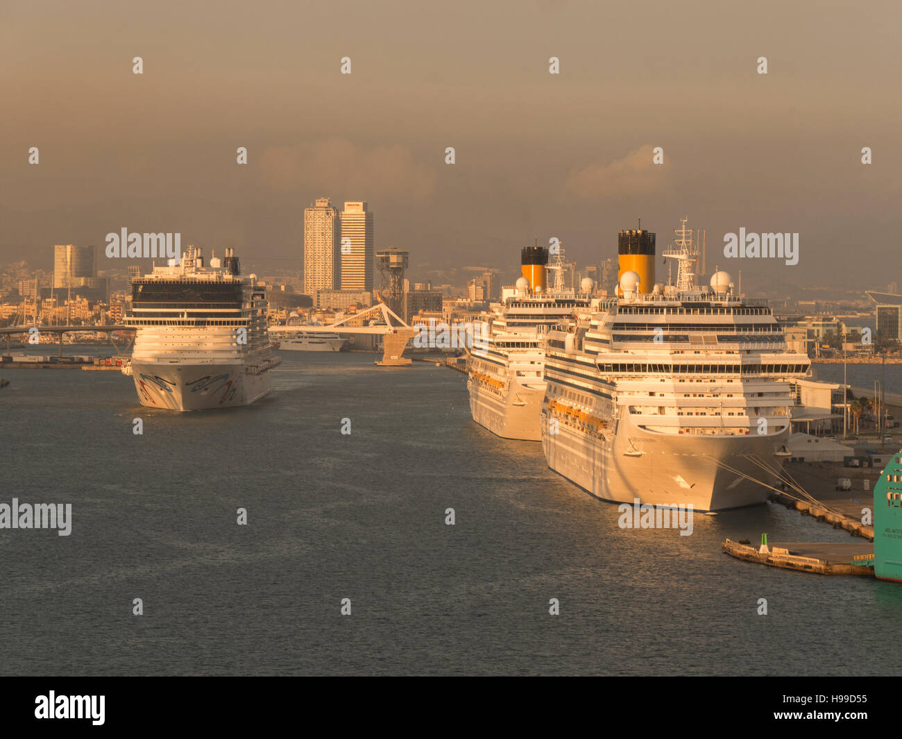 View of Barcelona port with multiple cruise ships taken from Royal Caribbean Harmony of the Seas Stock Photo