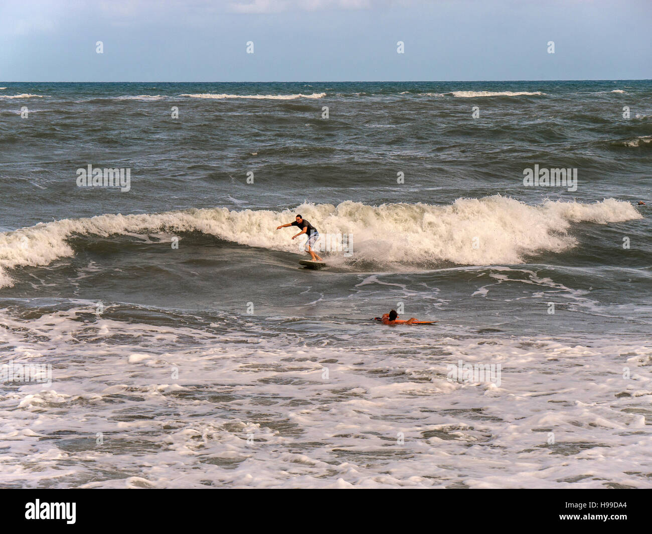 People surfing in the waves on Jupiter Beach in Florida Stock Photo Alamy