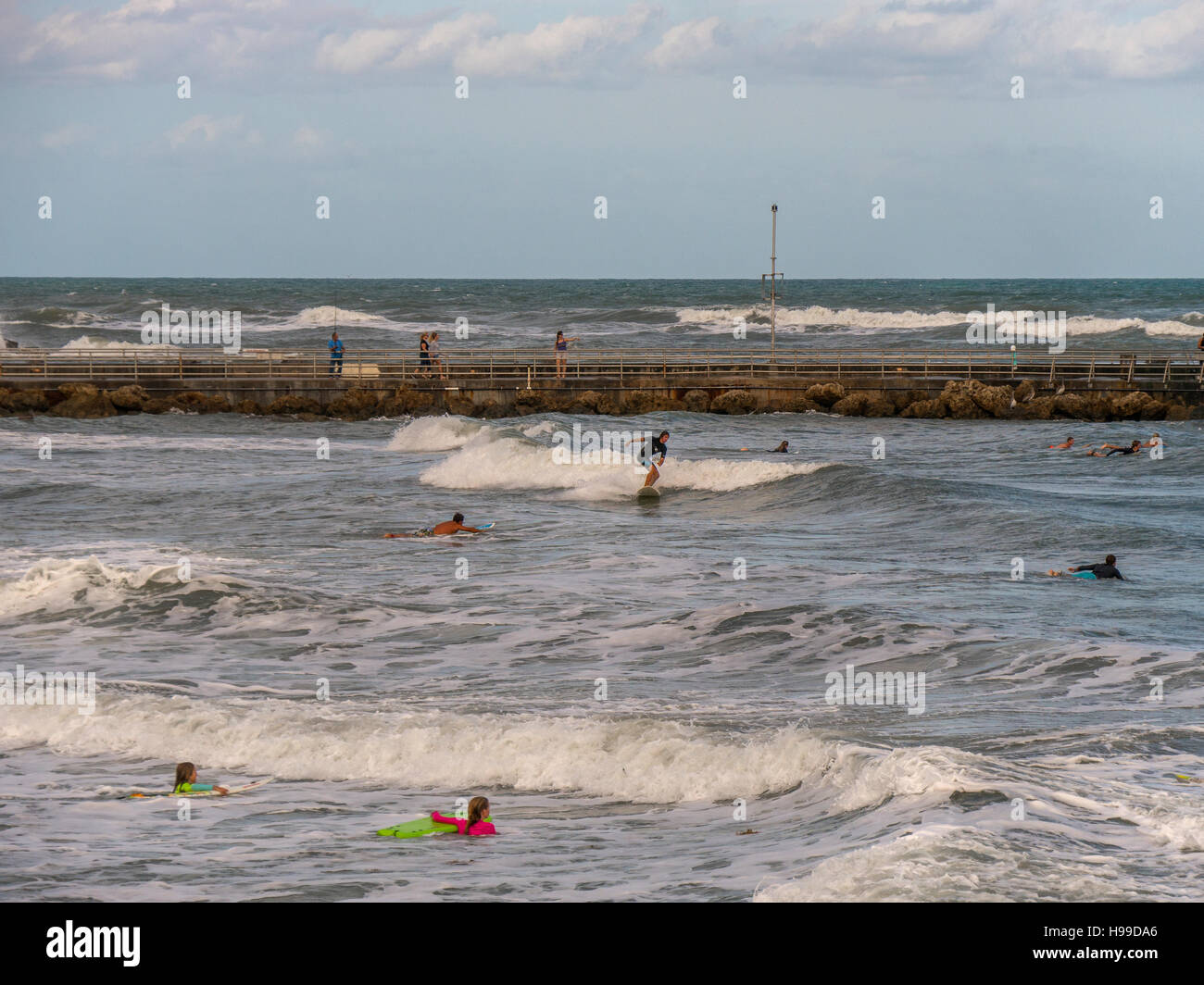 People surfing in the waves on Jupiter Beach in Florida Stock Photo Alamy