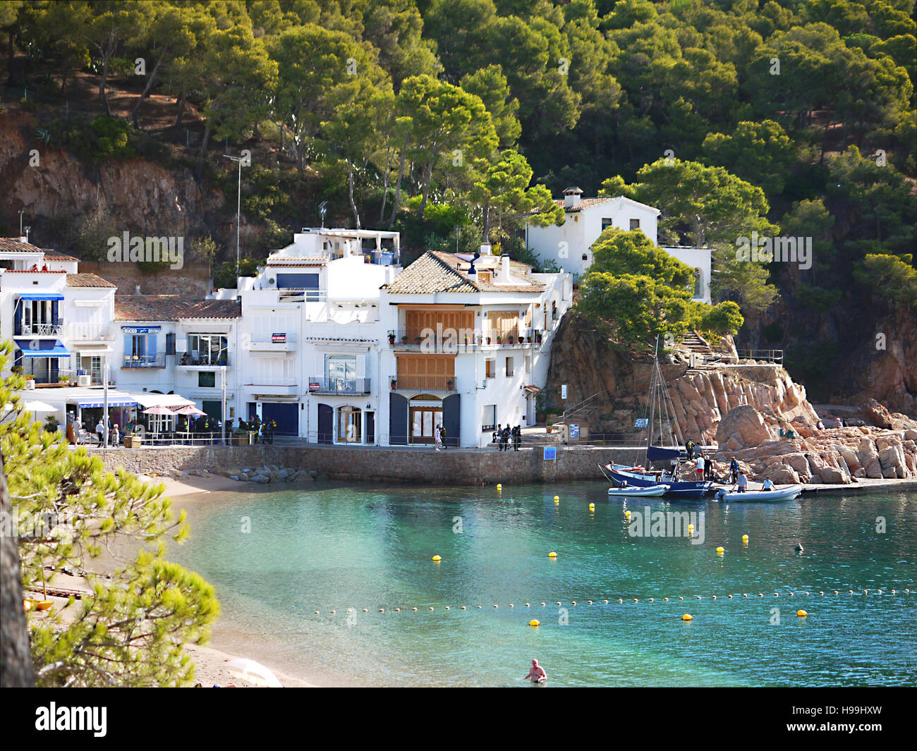 general view of the beach and houses in the tiny village of tamariu costa brava spain stock photo alamy