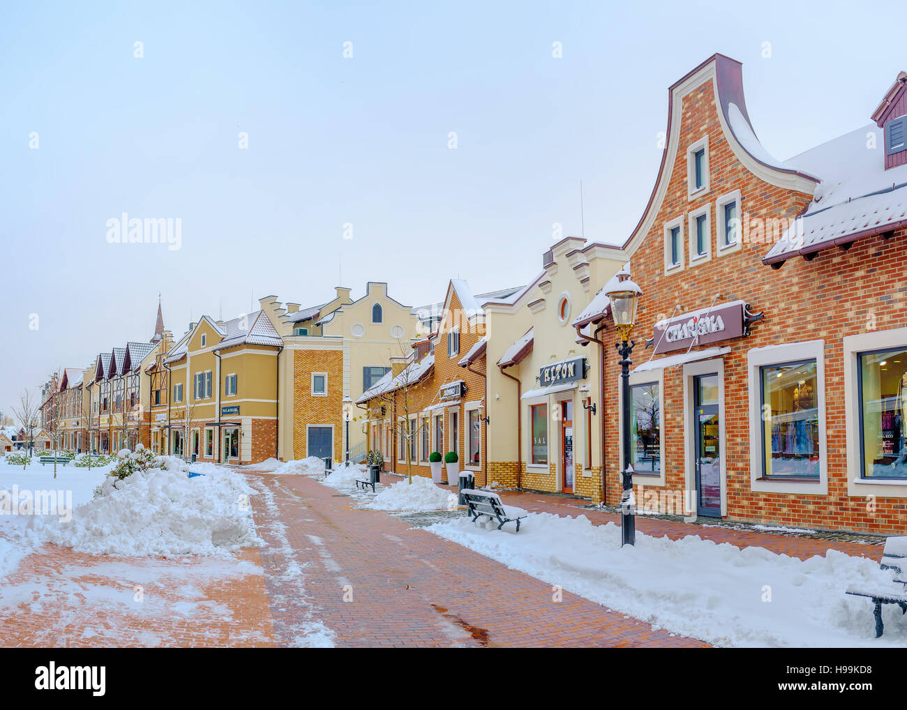 The scenic Dutch houses, occupied with boutiques and cafes and surrounded by snowy streets, Kyiv, Ukraine. Stock Photo