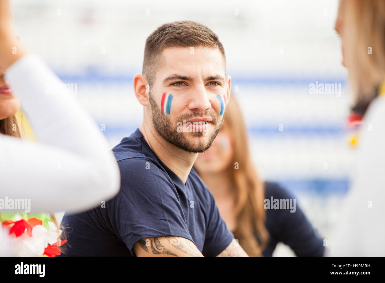 Portrait of soccer fan with face paint Stock Photo Alamy