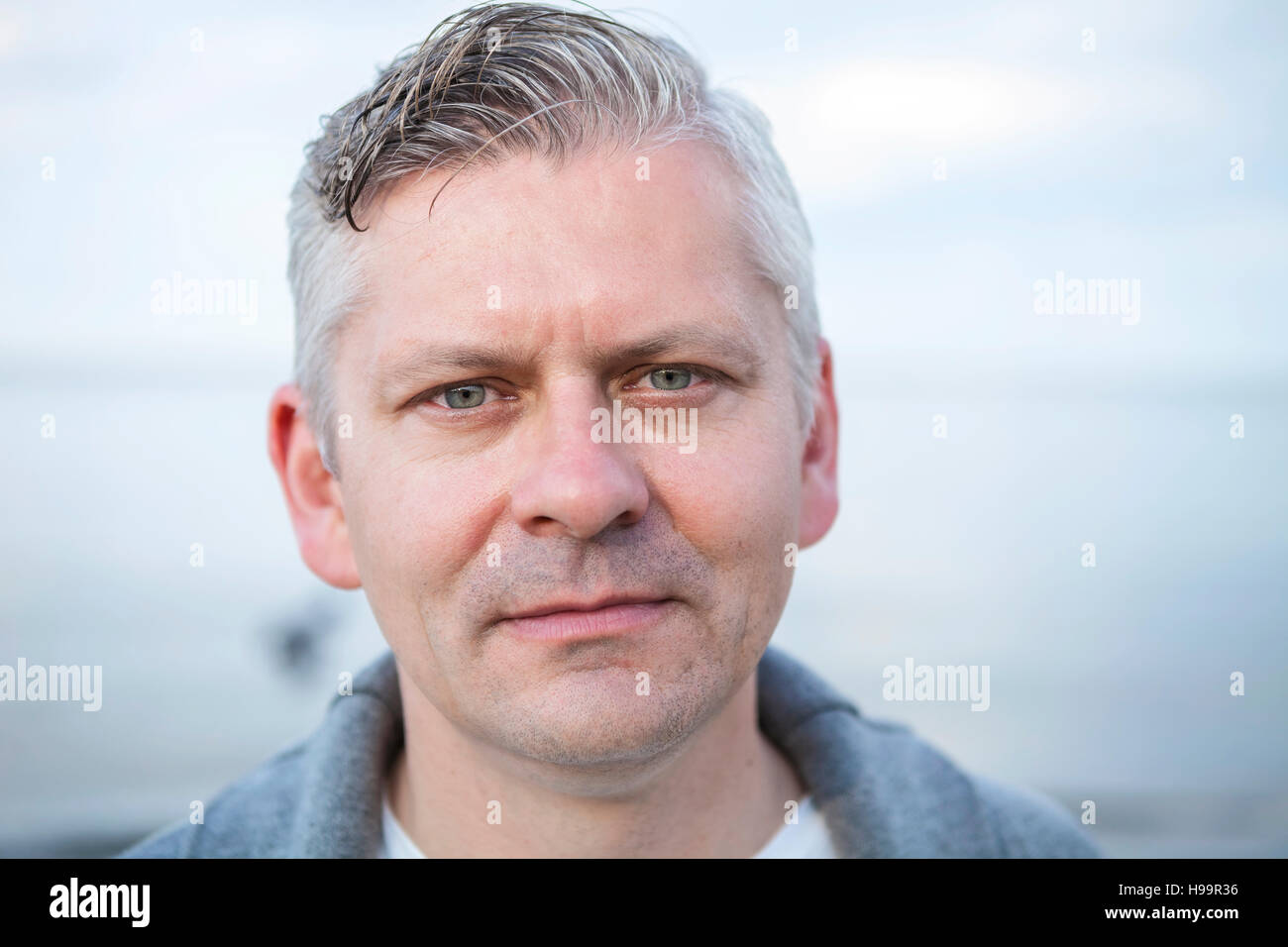 Portrait of mature man with gray hair Stock Photo