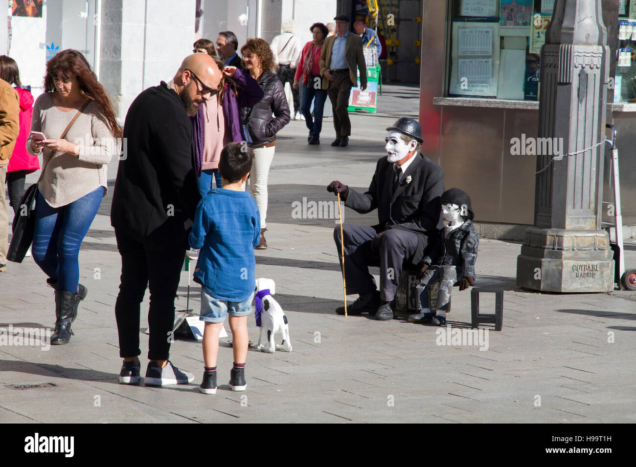 Madrid Spain performer Charlie Chaplin cosplay father and son Stock Photo