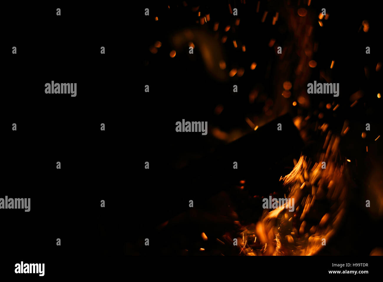 Flames of a campfire in the night on black background Stock Photo - Alamy