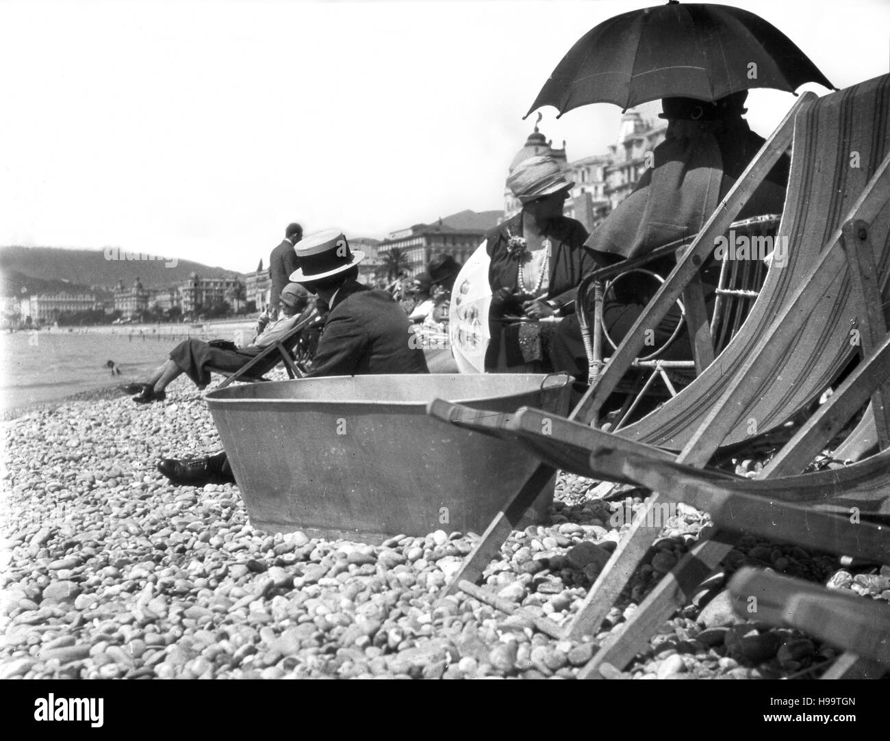 Tin bath and people on the beach at Nice in France 1925 Stock Photo