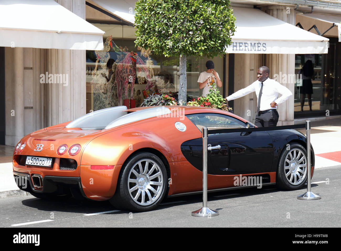 Bugatti Veyron parked outside Hermes in Monaco Stock Photo - Alamy