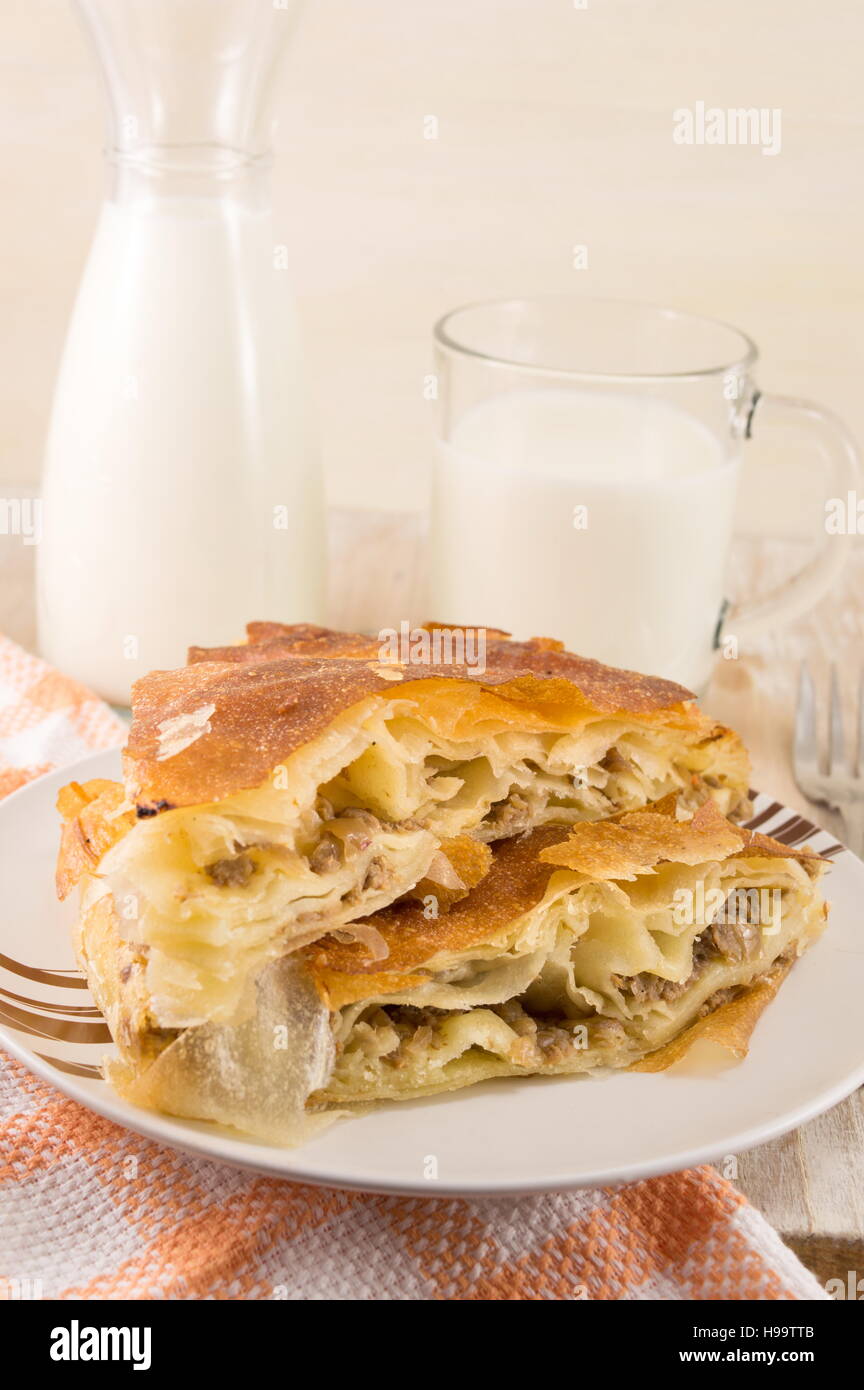Cheese pie with a yogurt on a glass plate Stock Photo