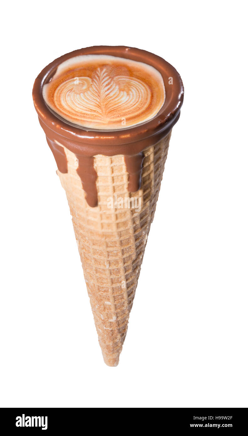 Coffee in waffle cone dipped in chocolate with drawings in cappuccino / latte milk foam, latte art, isolated Stock Photo