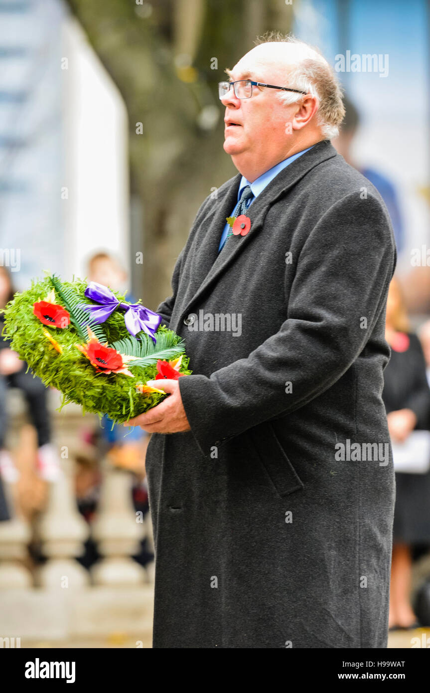 Belfast, Northern Ireland. 13 Nov 2016 - Chairman of Bombardier, Belfast, and Honorary Consul for Canada in Northern Ireland, Kenneth Ken Brundle, lays a wreath from Canada at Remembrance Sunday service. Stock Photo