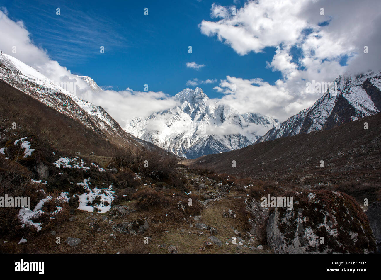 View of the mountains near the village of Bimthang on the Manaslu Circuit, 12 days from the trailhead at Arughat Bazaar. The 16-day Manaslu Circuit is Stock Photo