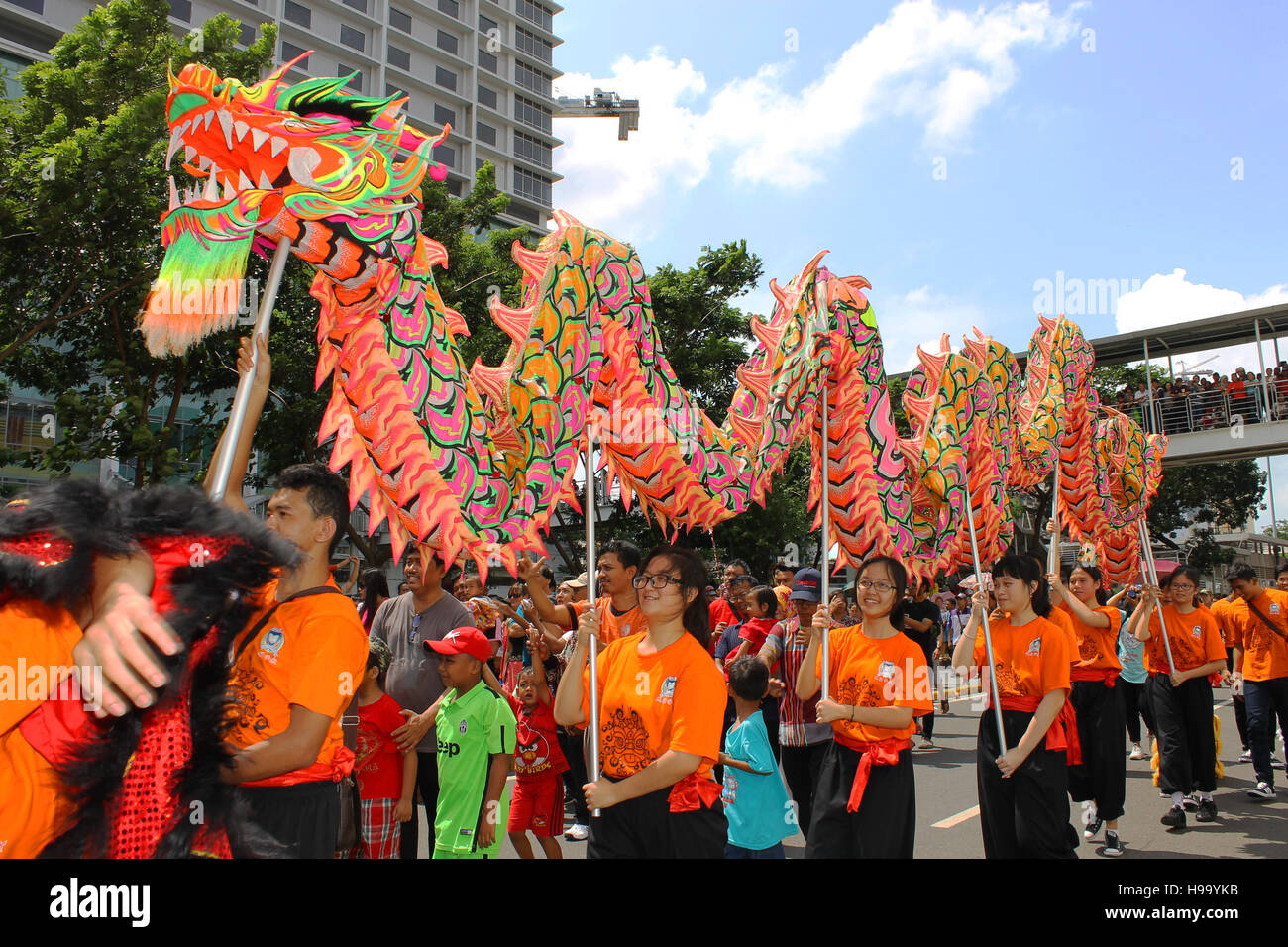 Players of liong or dragon in Chinese mythology in Cap Go Meh carnival which held at Glodok, Jakarta. Stock Photo