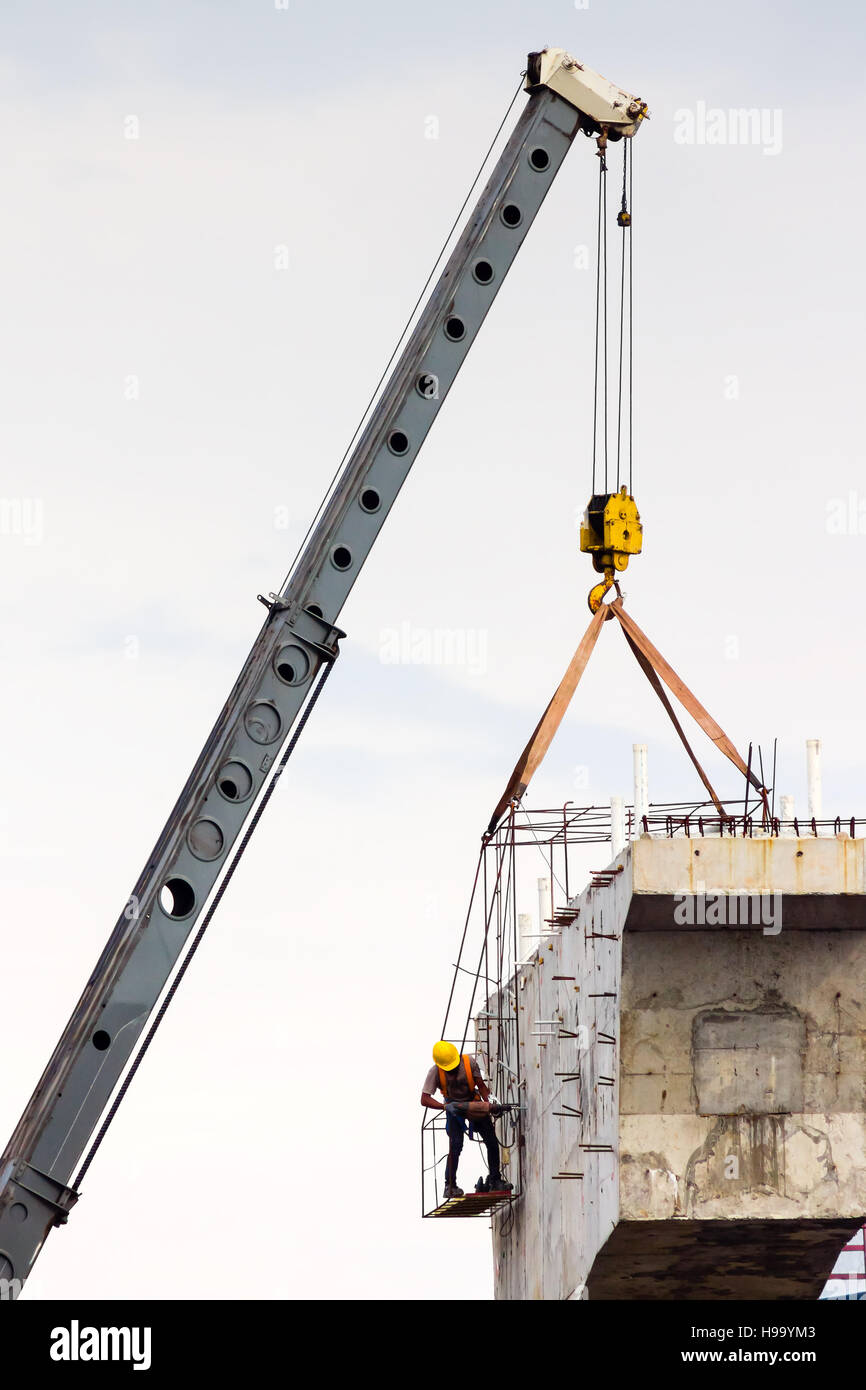 people working at a bridge column construction which is build column