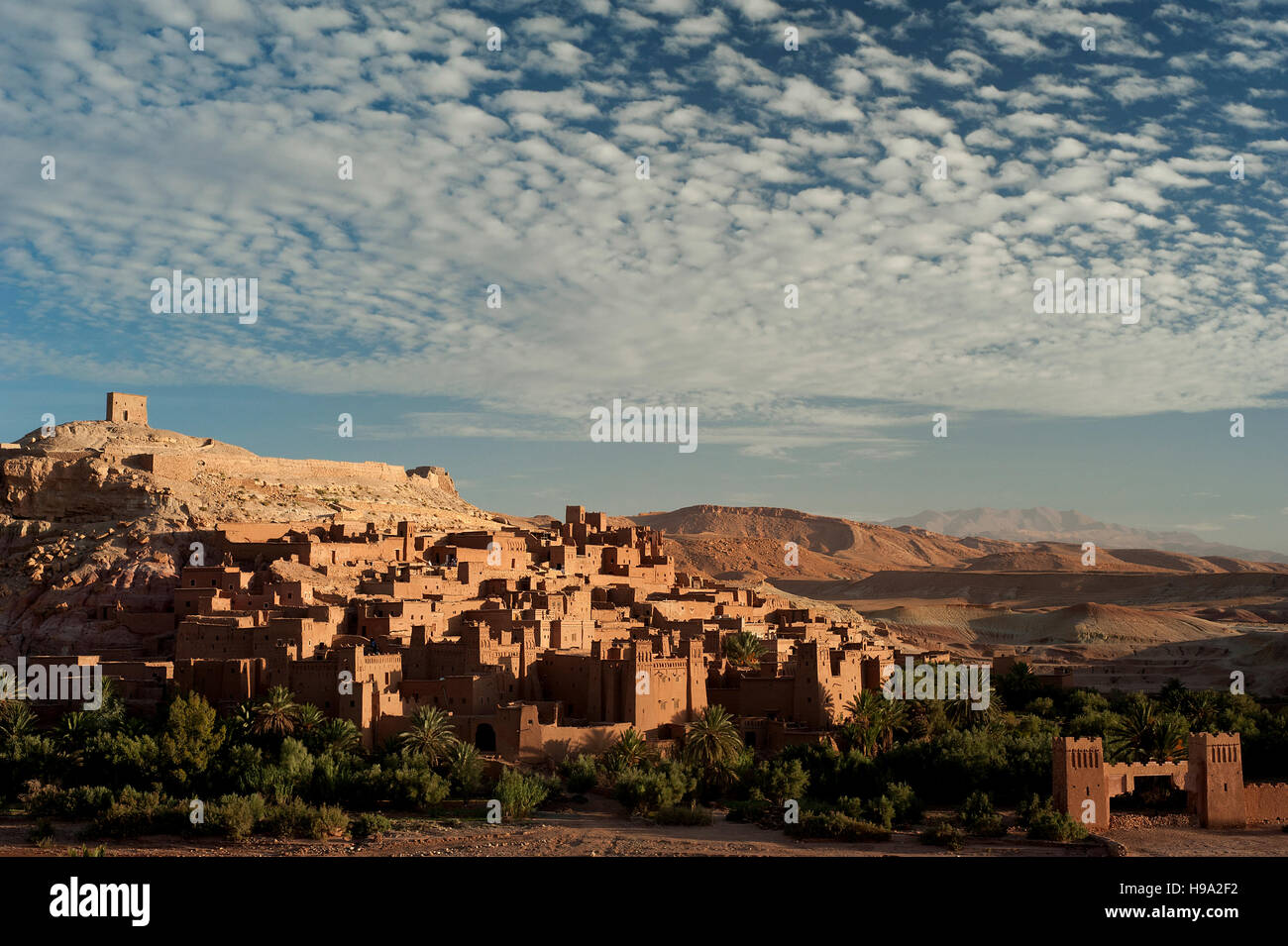 Ait Benhaddou, Morocco: the fortified town or ksar, a world heritage site, lit up at sunrise in Morocco's arid Atlas Mountains. Stock Photo
