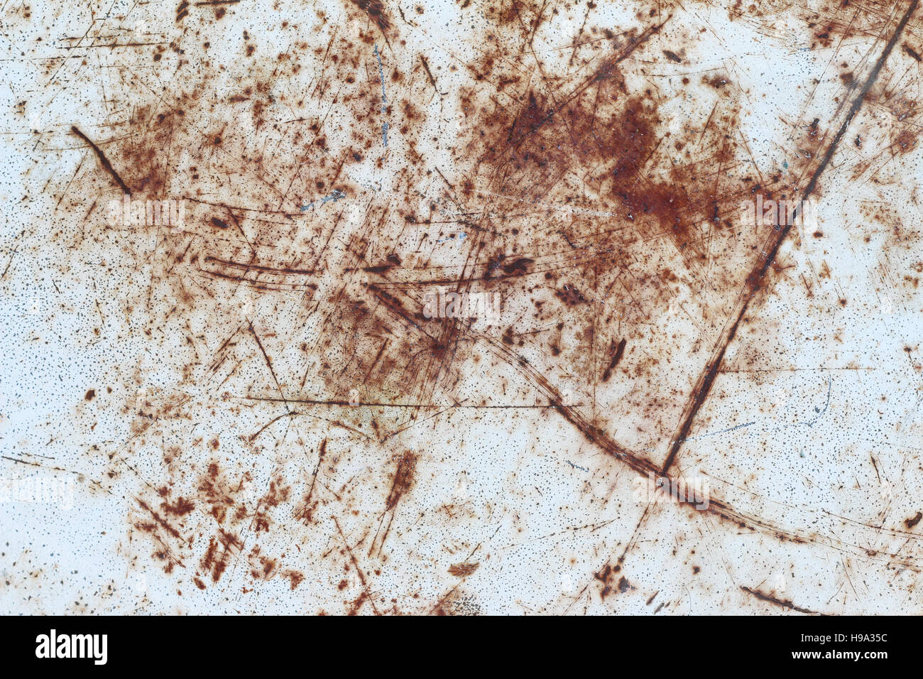 Scratches on the surface of the rusted metal plate Stock Photo