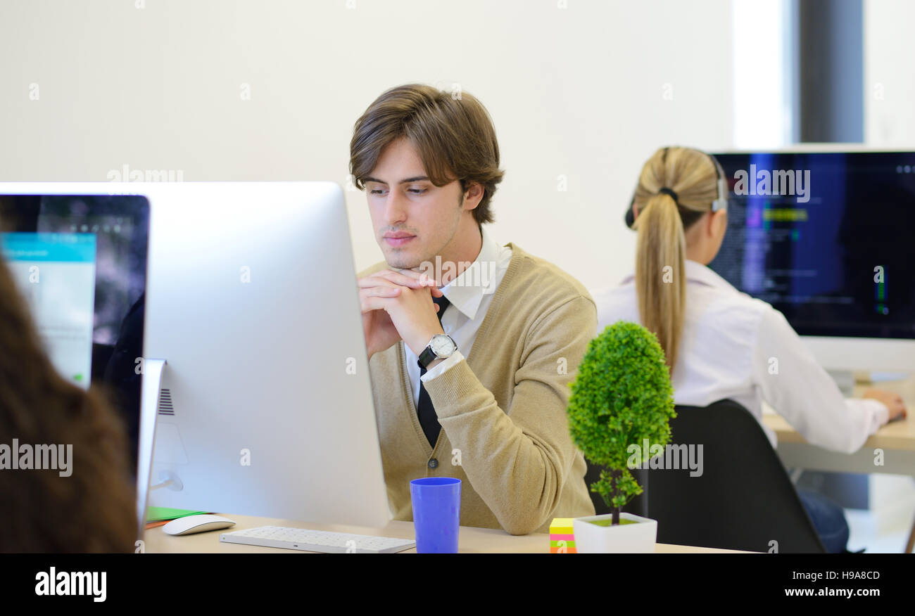 startup business, software developer working on computer at modern ...