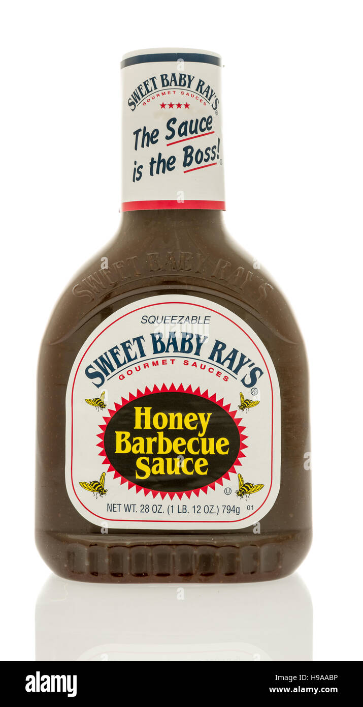 Winneconne, WI - 20 November 2016: Bottle of Sweet Baby Ray's honey barbecue sauce on an isolated background. Stock Photo