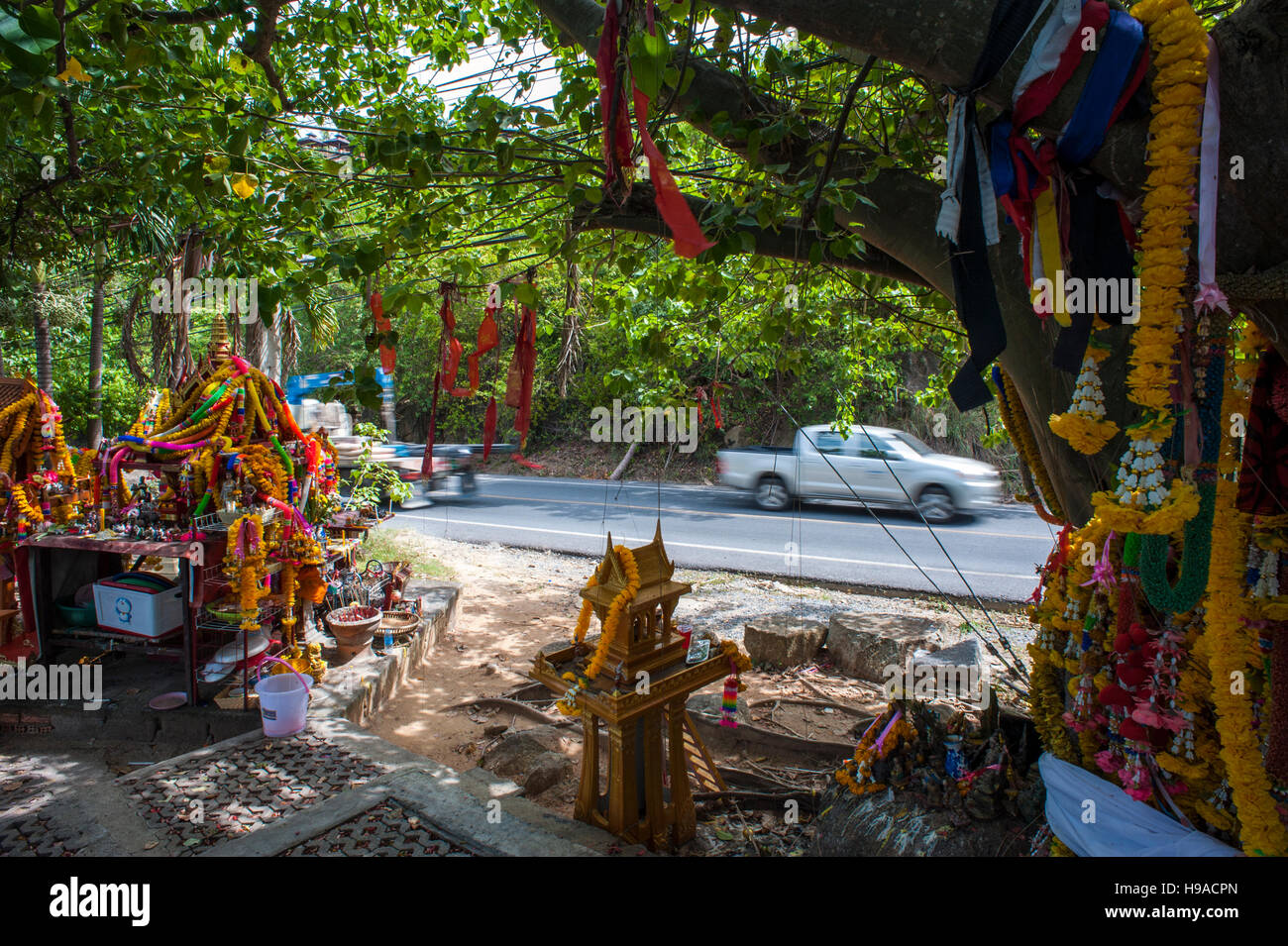 A Buddhist shrine next to Lad Koh viewpoint on Ko Samui's ring road,  Thailand Stock Photo - Alamy