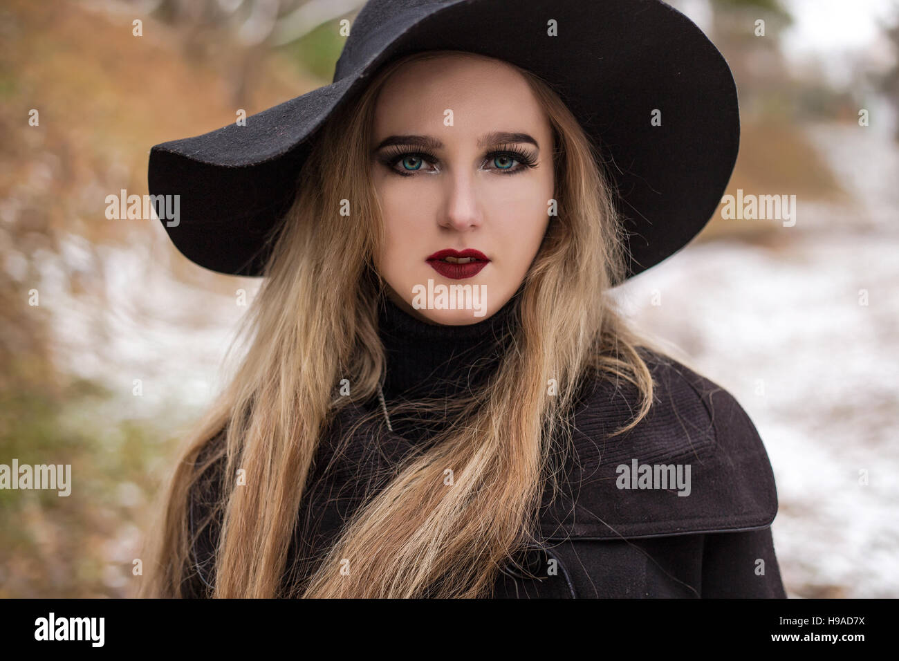 Portrait of a young beautiful woman in black hat retro style Stock ...