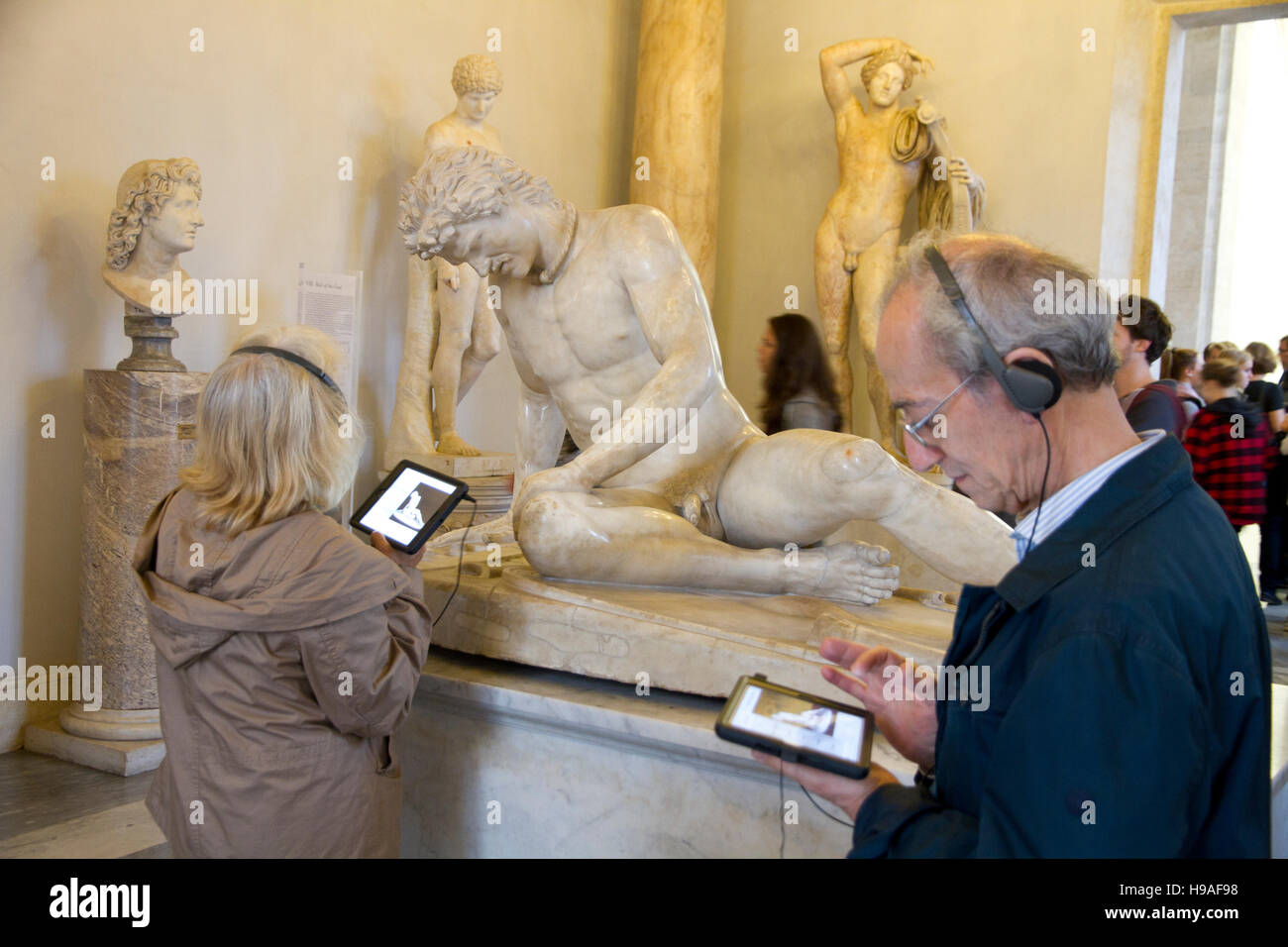 Tourist looking statue art scene Rome, italy, capitoline museums, musei capitolini, art heritage touristic landmark Stock Photo