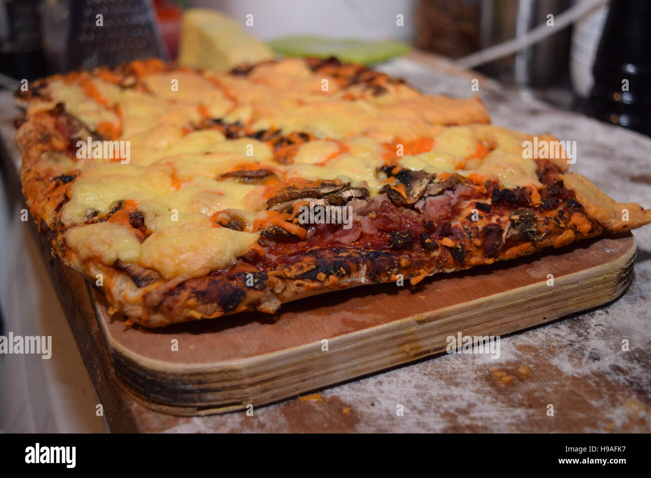 Homemade rectangular pizza with ingredients Stock Photo - Alamy
