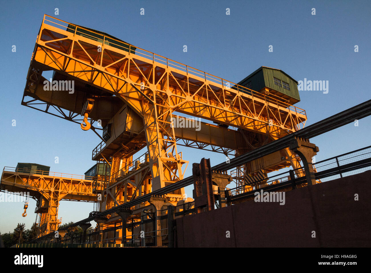Overhead cranes at the Ivankovo water power plant. Stock Photo