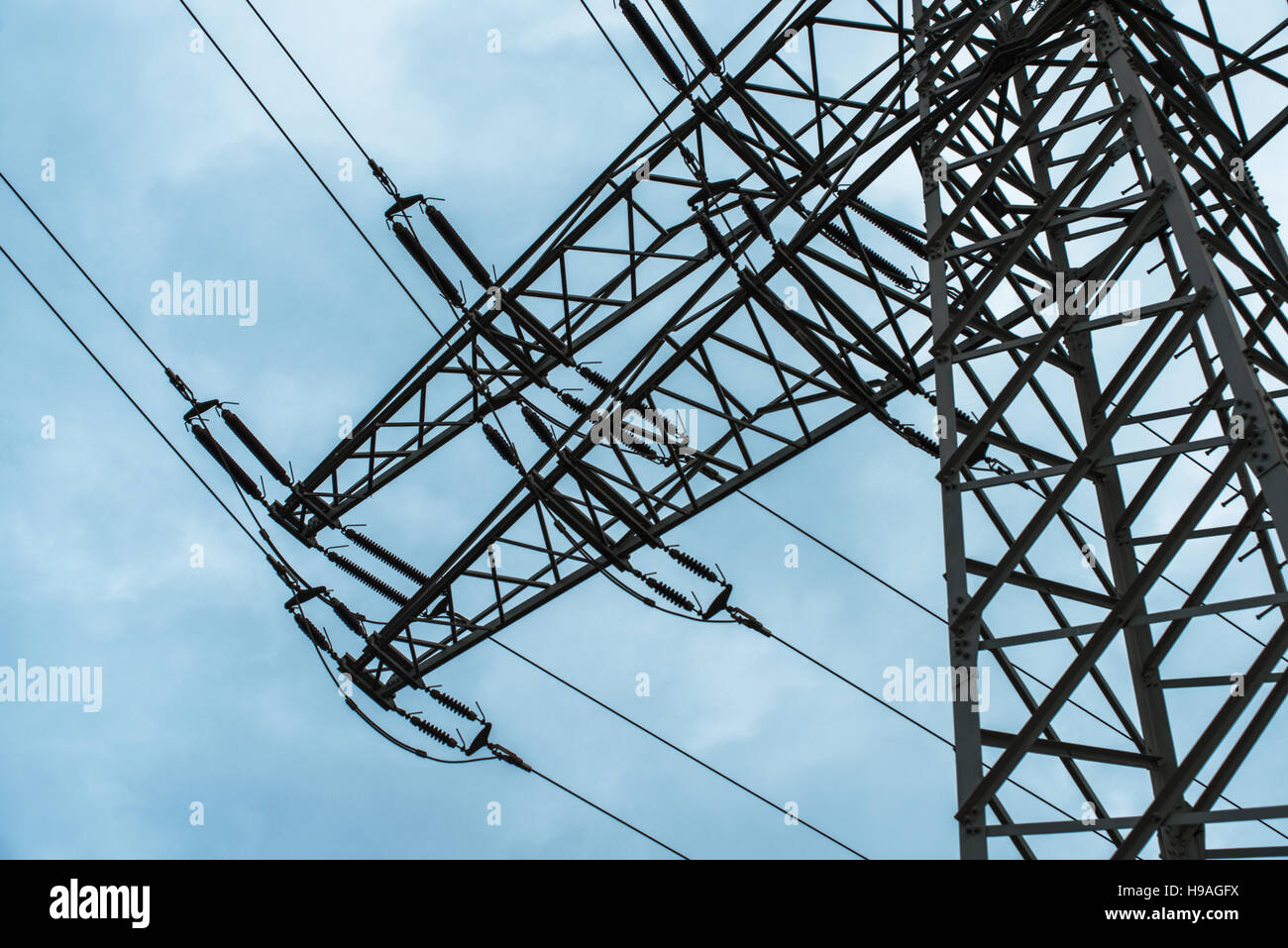 Power transmission high voltage with dramatic blue sky with clouds ...