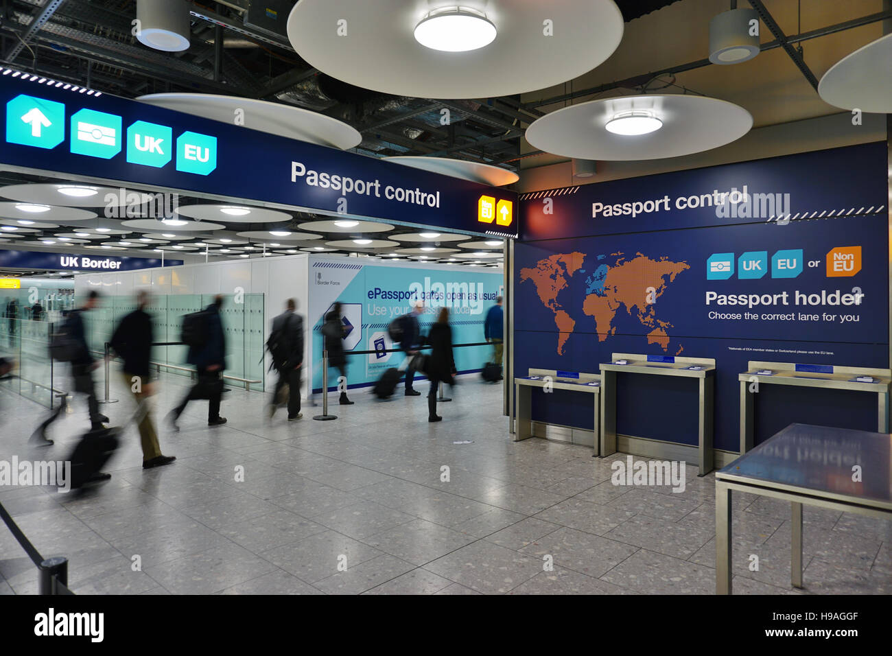 The UK and European separate passport control and immigration lanes at London Heathrow International Airport (LHR) Stock Photo