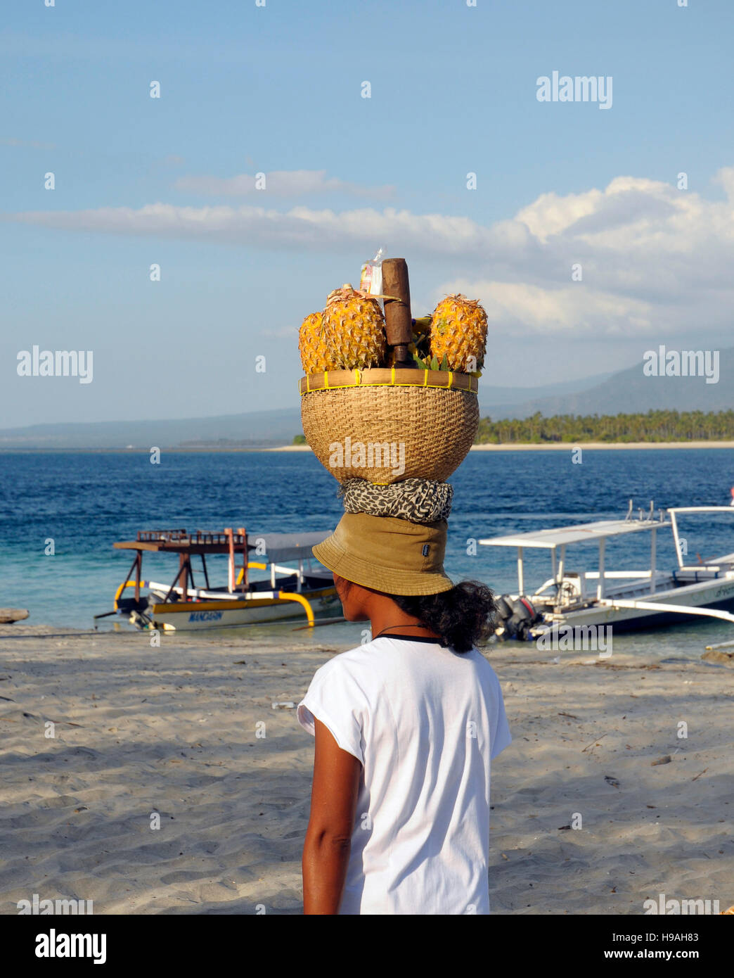 Gili Air, Gili Islands, Lombok Indonesia, A Pineapple fruit vendor