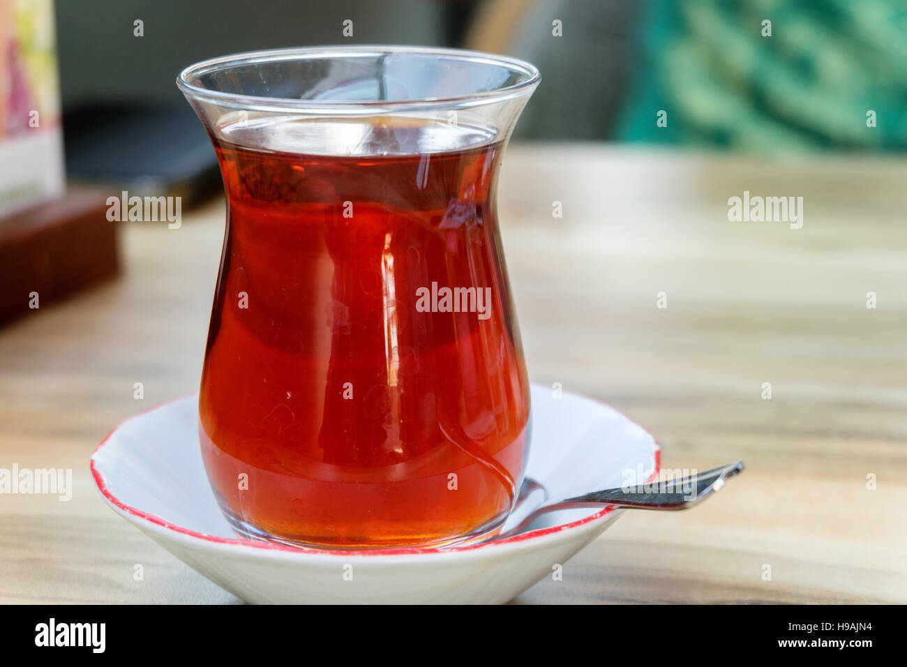 glass of Turkish tea, on wooden table Stock Photo