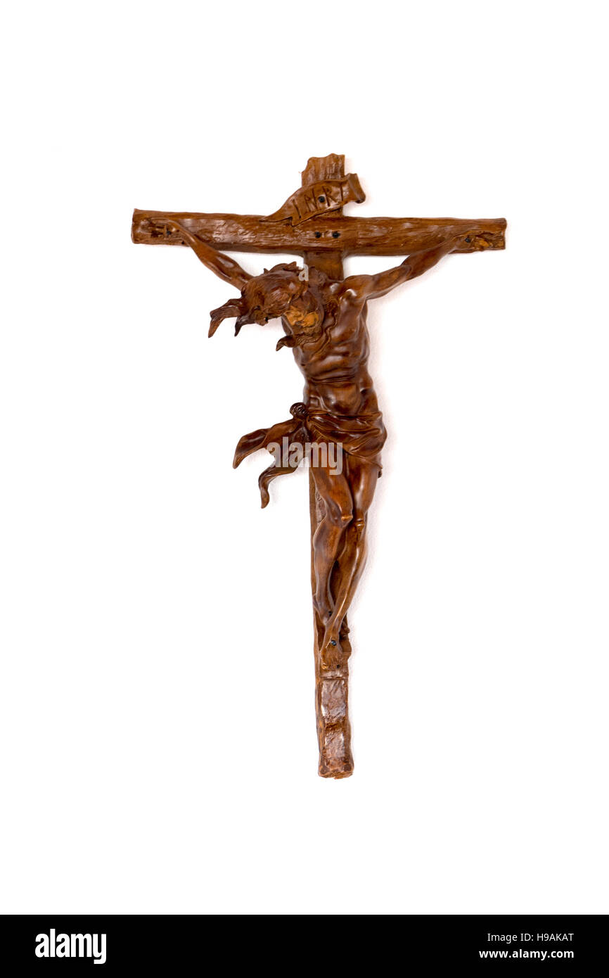 Wooden Jesus on a cross with clipping path Stock Photo