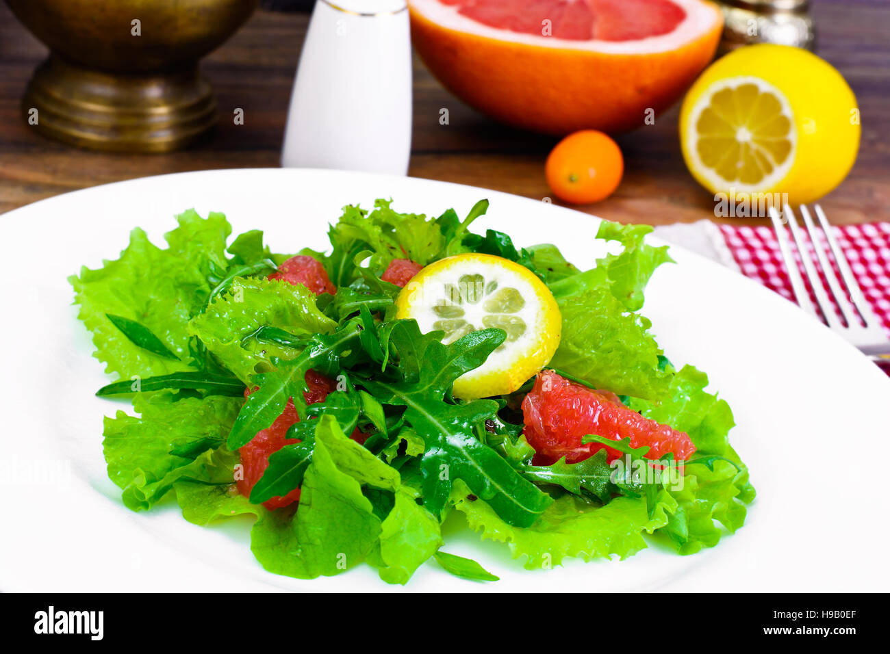 Salad with Mix Batavian, Frise, Radicchio, Chicory, Arugula and Grapefruit Studio Photo Stock Photo