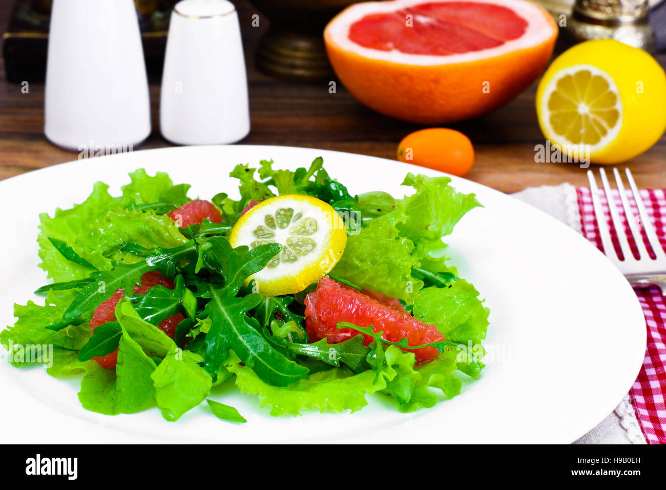 Salad with Mix Batavian, Frise, Radicchio, Chicory, Arugula and Grapefruit Studio Photo Stock Photo