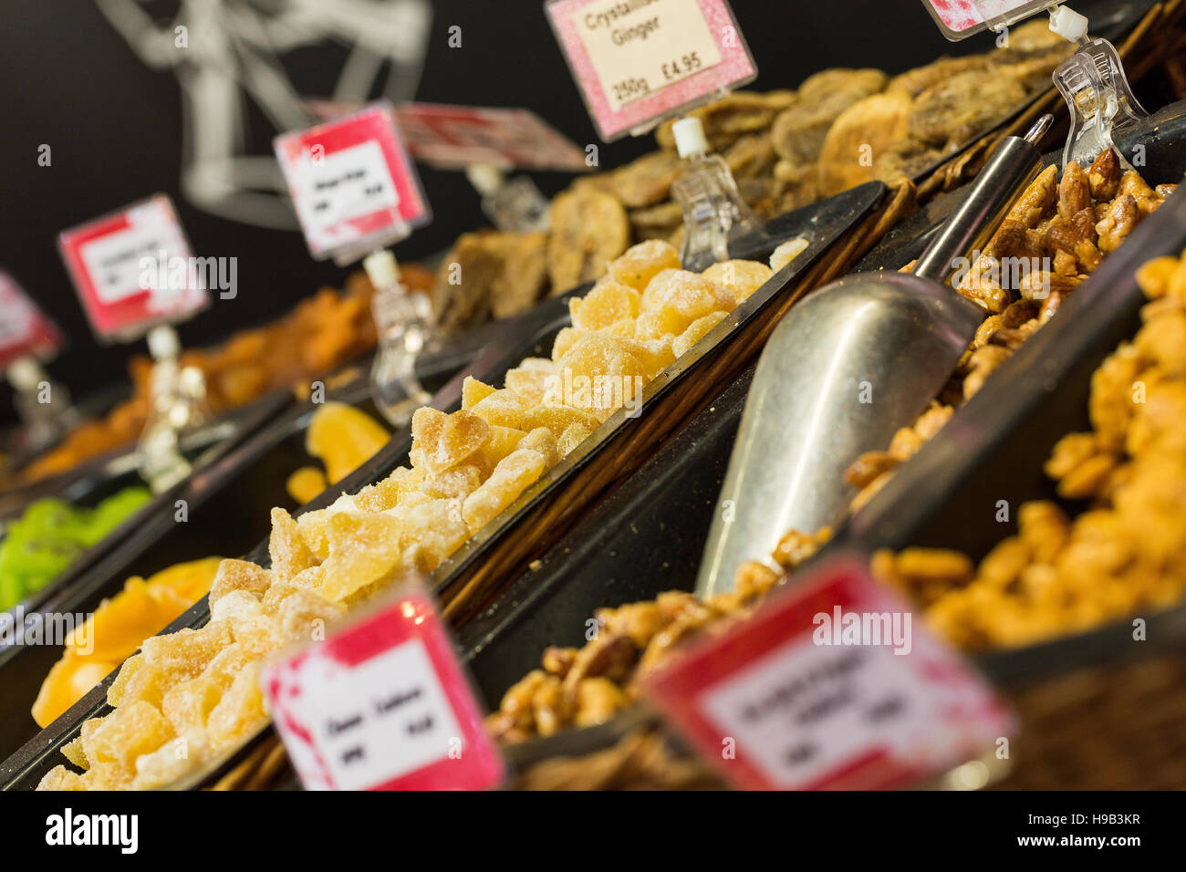Range of natural food on sale at farmers market stall Stock Photo