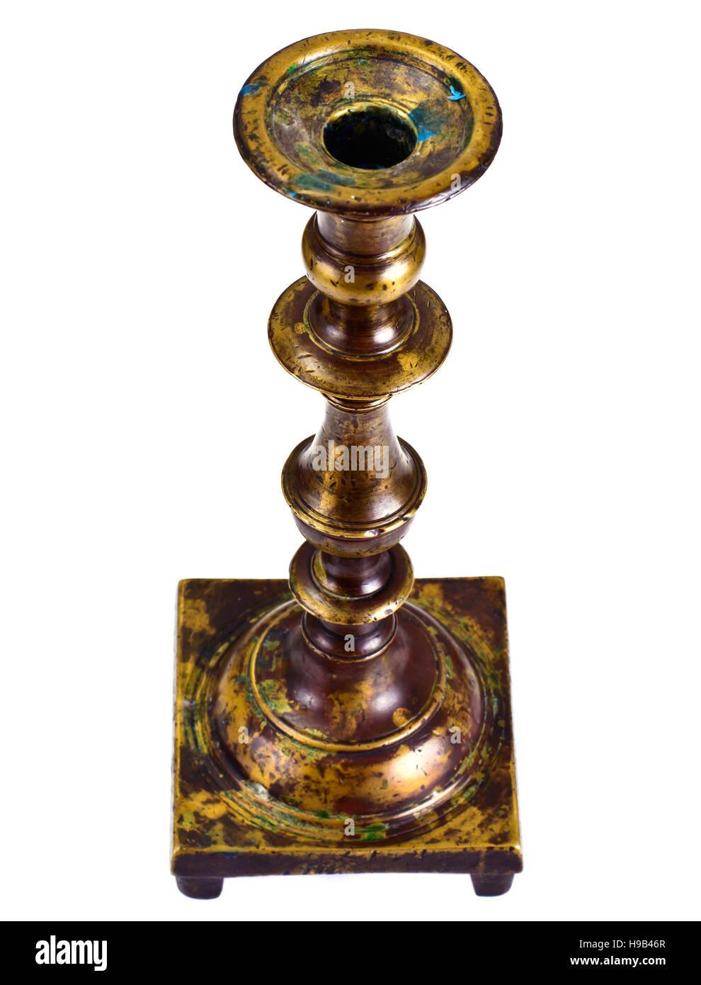 Old Brass Candlestick on a White Background Studio Photo Stock Photo