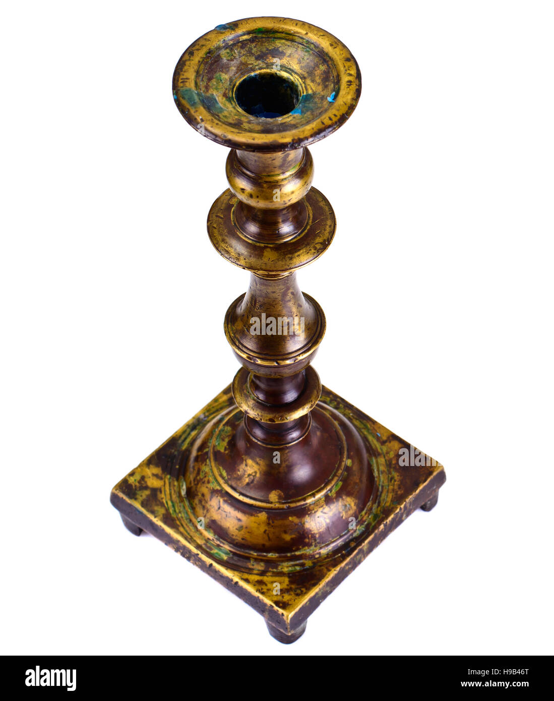 Old Brass Candlestick on a White Background Studio Photo Stock Photo