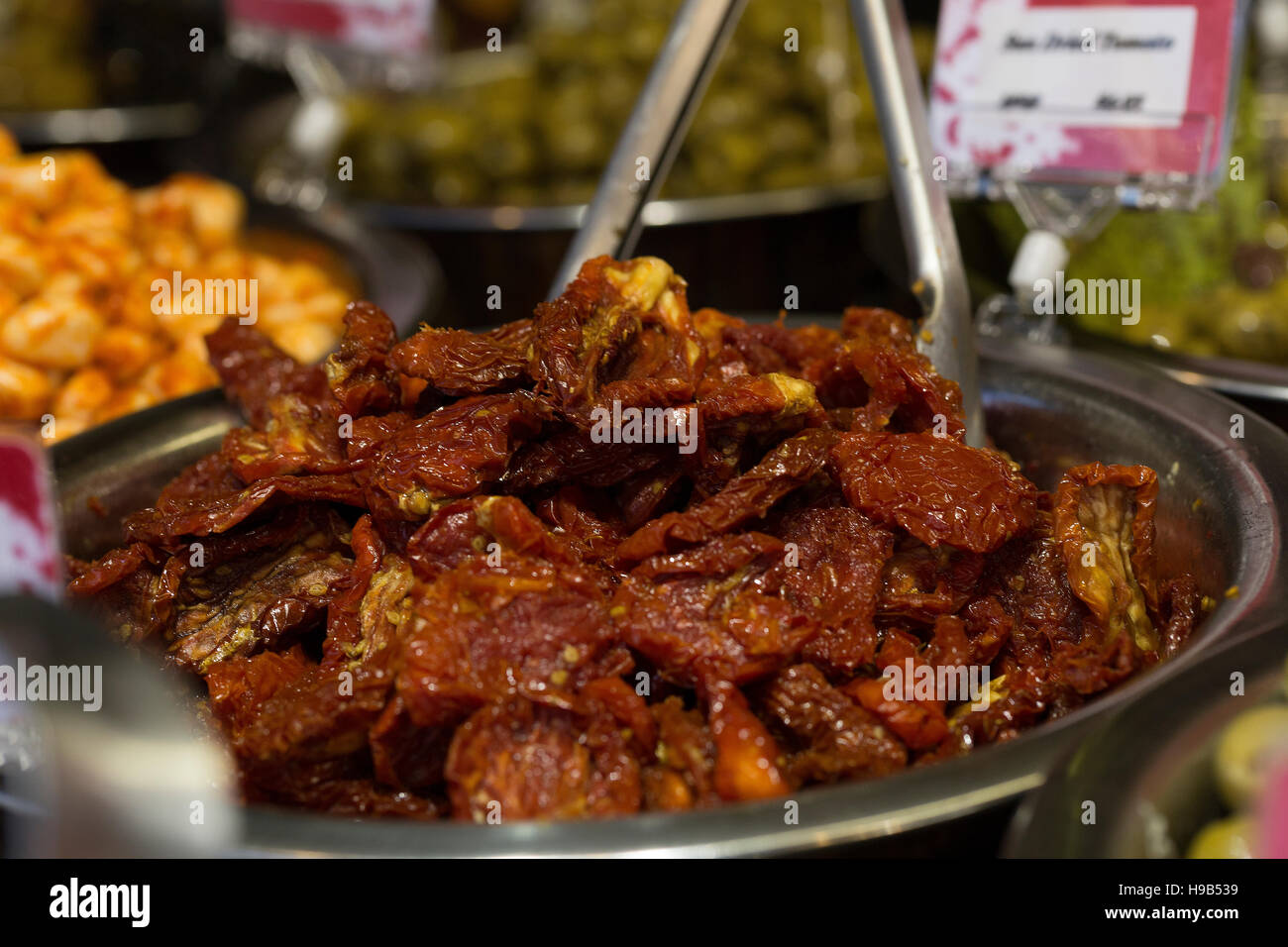 Christmas farmers market all you can eat buffet deli smorgasbord of dishes including sundried tomatoes Stock Photo