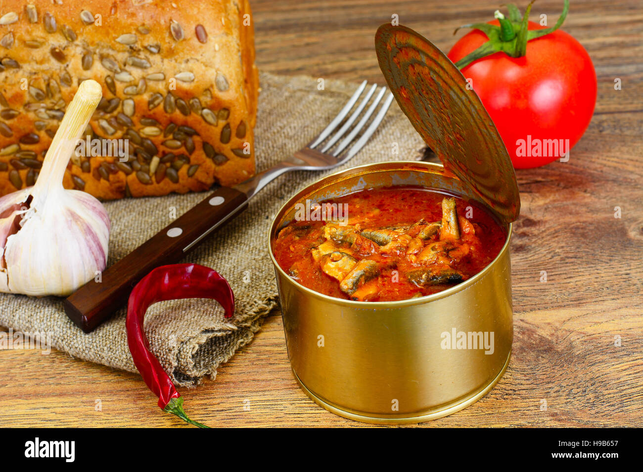 Cooking soup from sprats in tomato sauce Cooking soup from sprats in tomato sauce