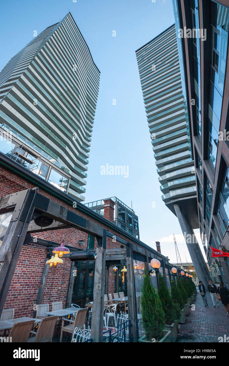 Condos and Victorian building coexist in the Distillery district  a tourist and shopping area in downtown Toronto Ontario Canada Stock Photo