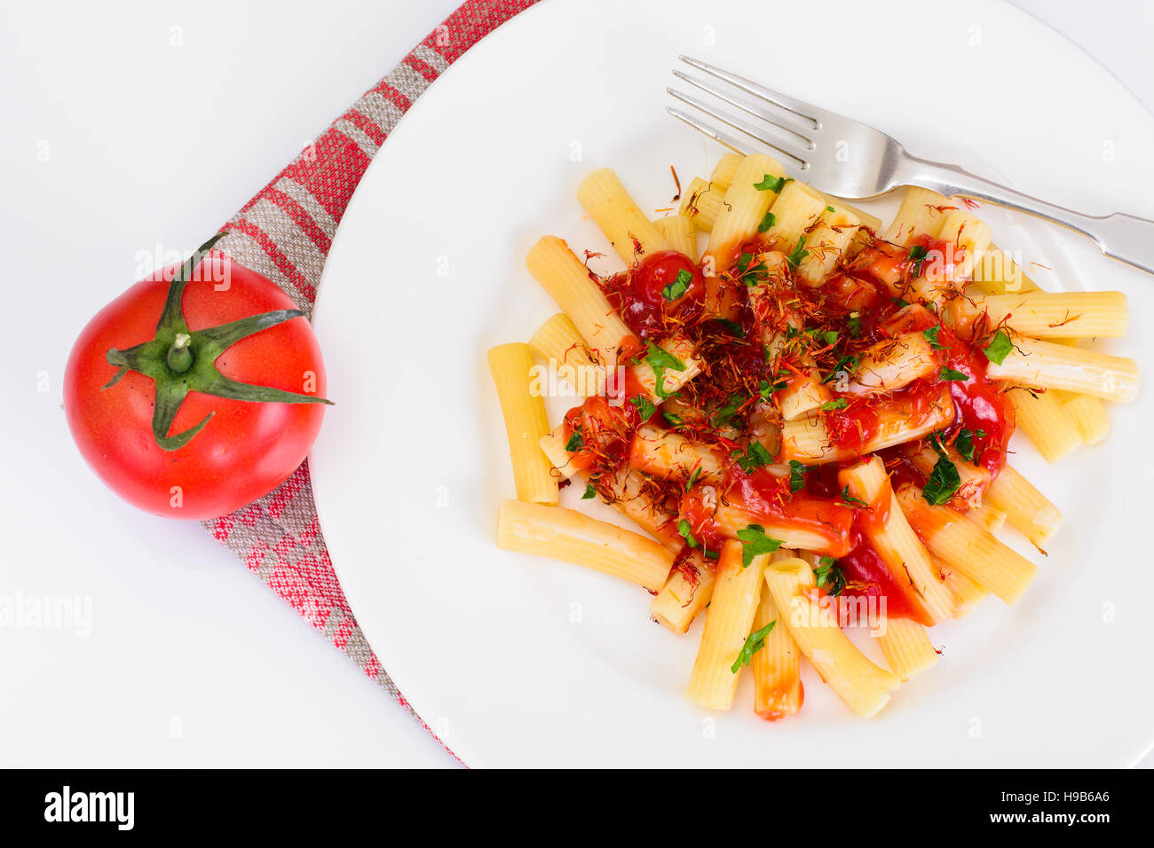 Pasta with Tomato Sauce Ketchup and Saffron Studio Photo Stock Photo